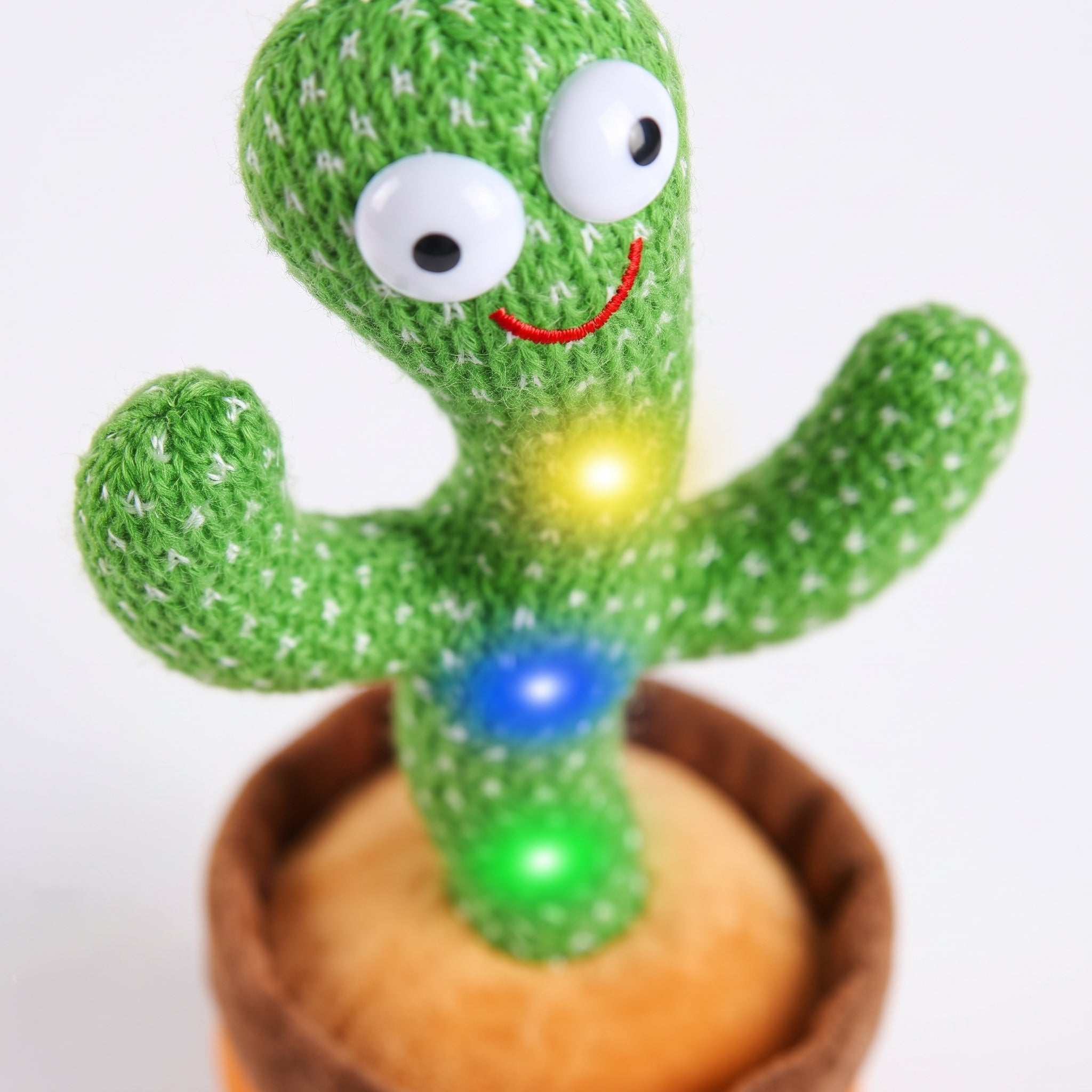Close-up of Dancing Talking Cactus plush with knitted texture and LED lights